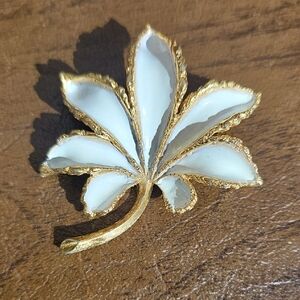 Elegant Gold and White Leaf Brooch